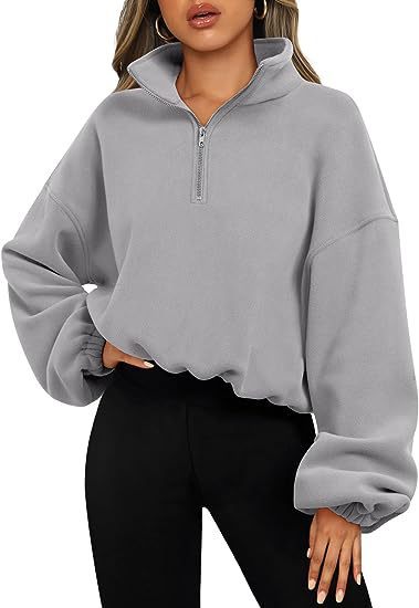 Women's relaxed fit half-zip sweatshirt with stand-up collar for sporty street style comfort