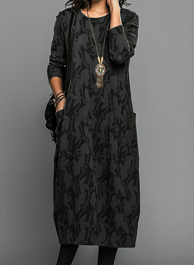 Women's casual midi dress with long sleeves, side pockets, and patterned hem for everyday elegant comfort