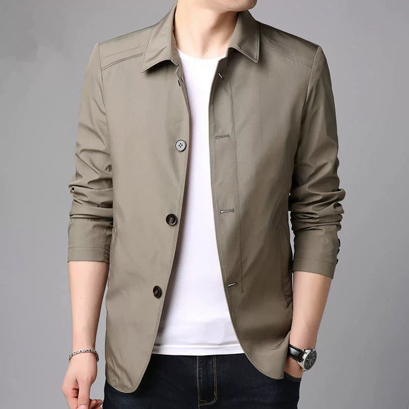 Navy blue tailored fit men's jacket with discreet button closure for modern professionals