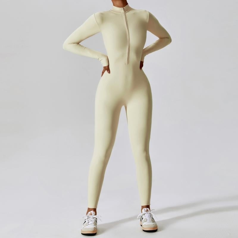 Women's seamless sports jumpsuit in neutral tone, slim athletic cut with friction-free construction