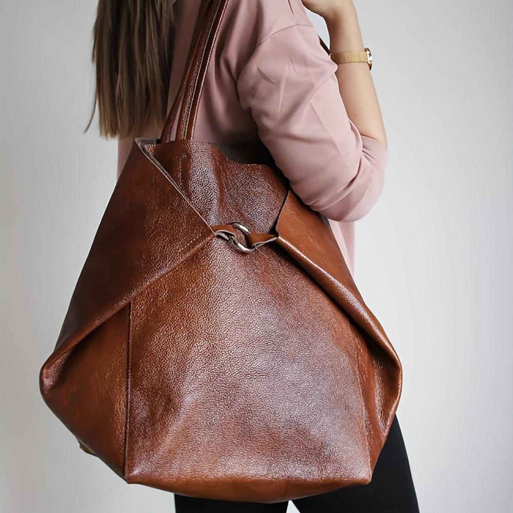 Heather vegan leather tote bag with detachable pouch, dual handles, everyday chic silhouette