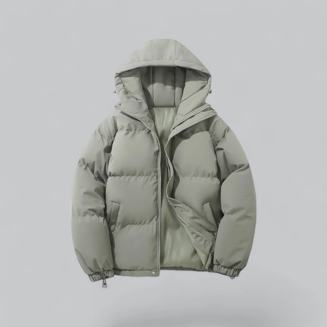 Unisex hooded winter puffer jacket in neutral tone, padded silhouette for urban cold-weather style