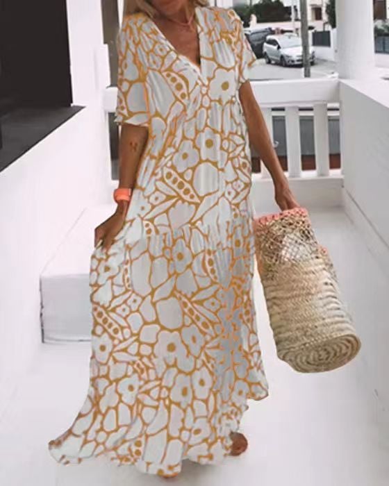 Women's loose fit print dress with airy silhouette, breathable fabric and modern trendy pattern
