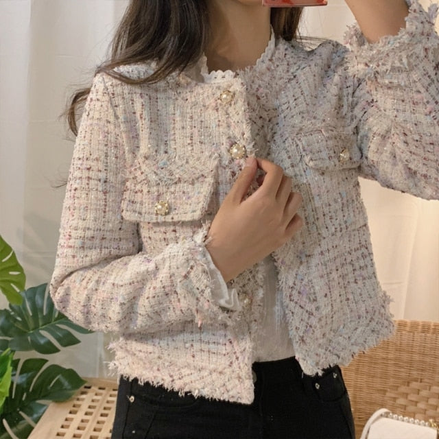 Women's cropped short jacket with shiny buttons, urban chic style, elegant versatile feminine silhouette