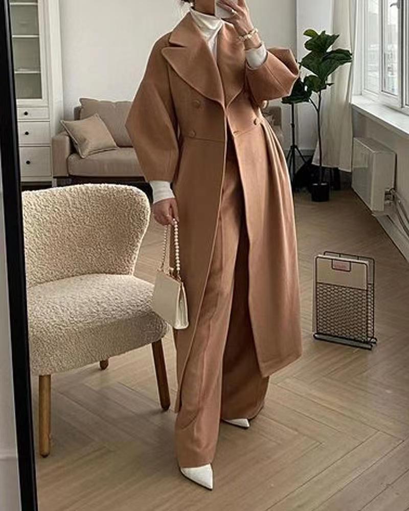 Women's vintage long coat with lantern sleeves, elegant retro classic silhouette in timeless style