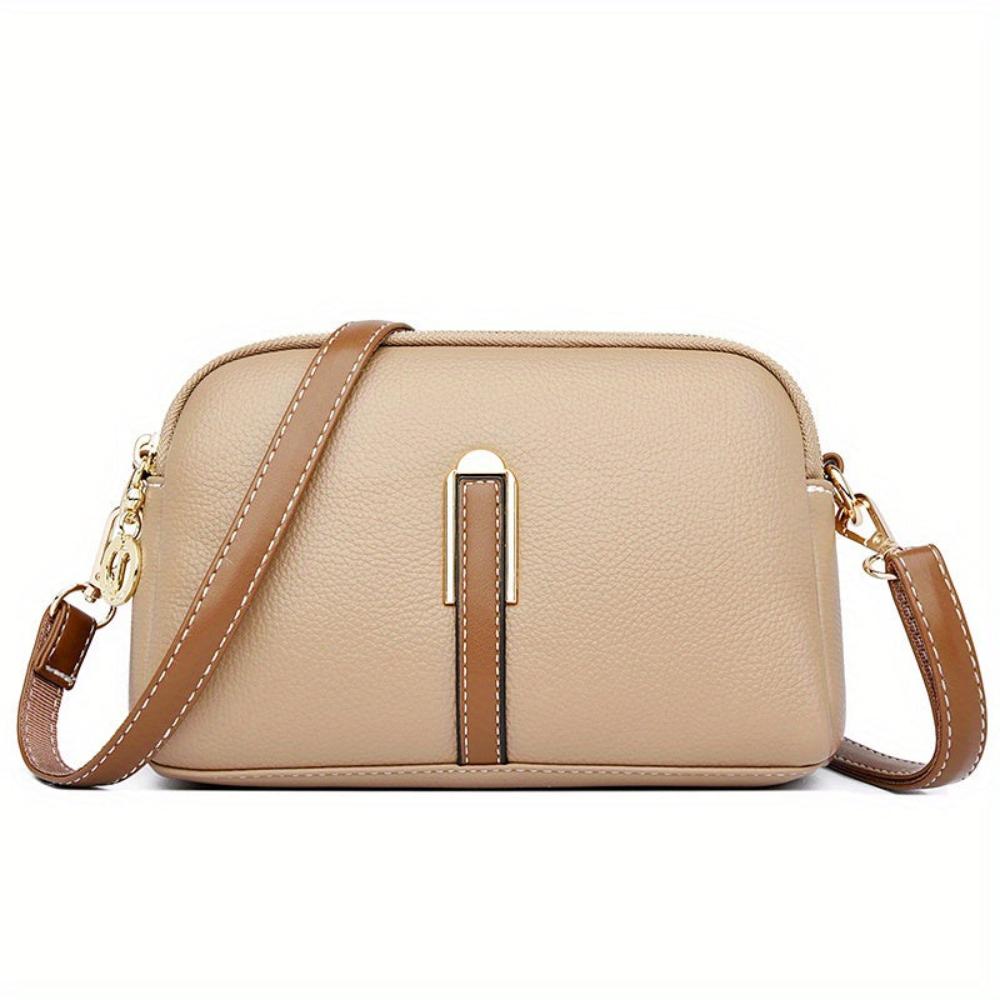 Elaine black vegan leather crossbody bag with gold-tone zipper adjustable strap compact chic