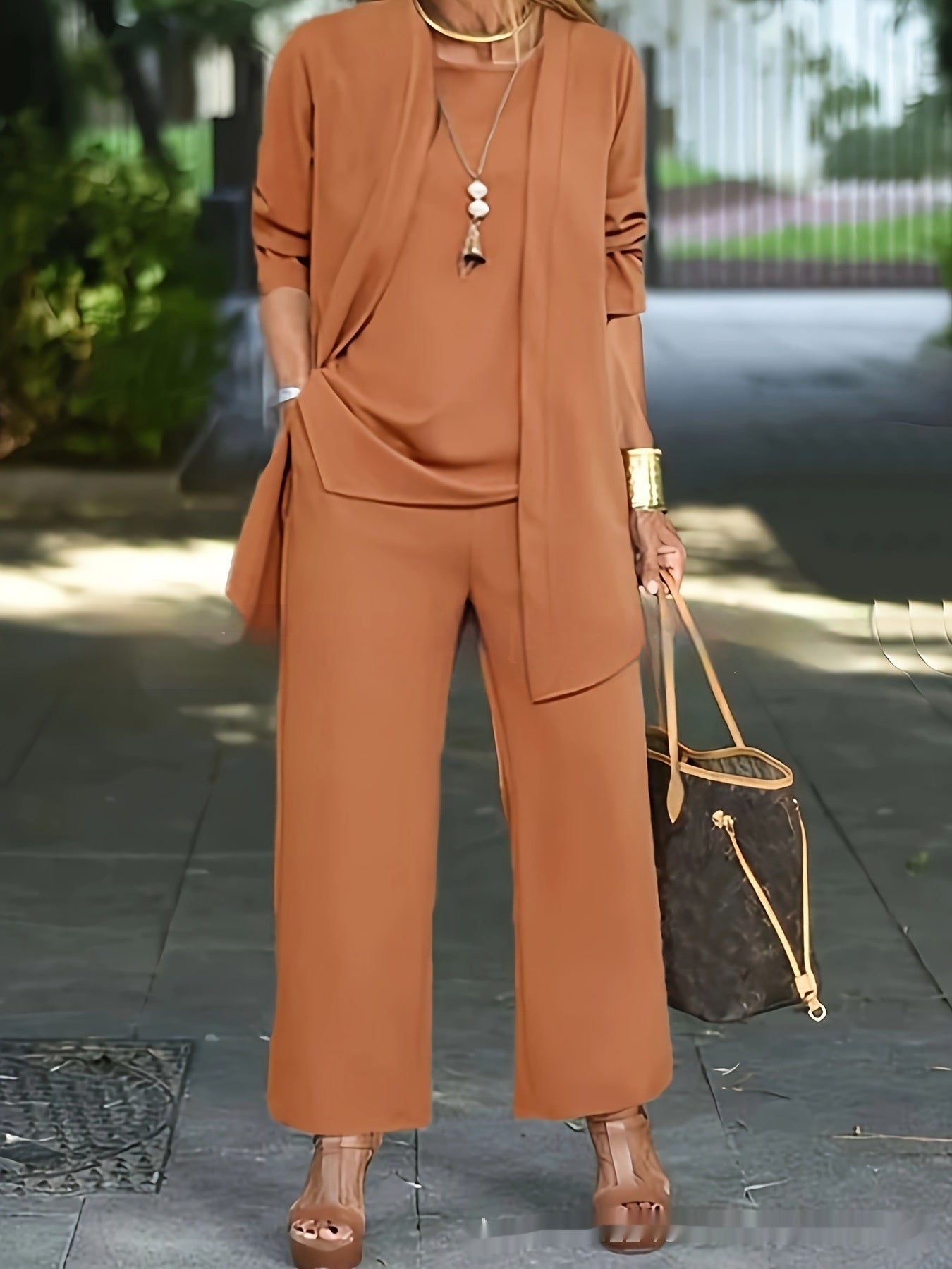 Women's elegant white sleeveless top, long jacket & wide-leg pantsuit set with round neckline