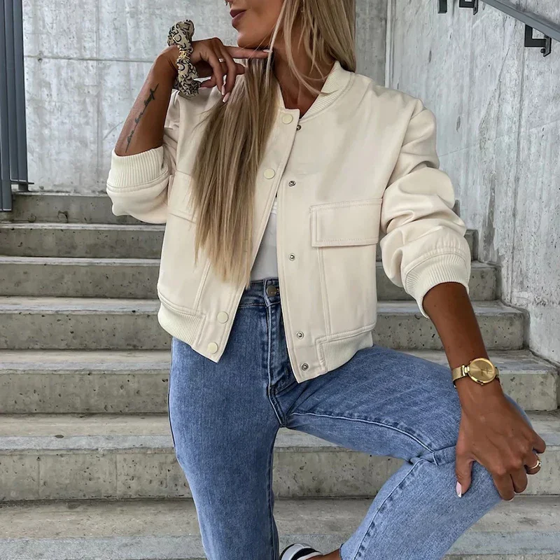 Women's short bomber jacket with snap button closure, flap pockets, casual street style fit