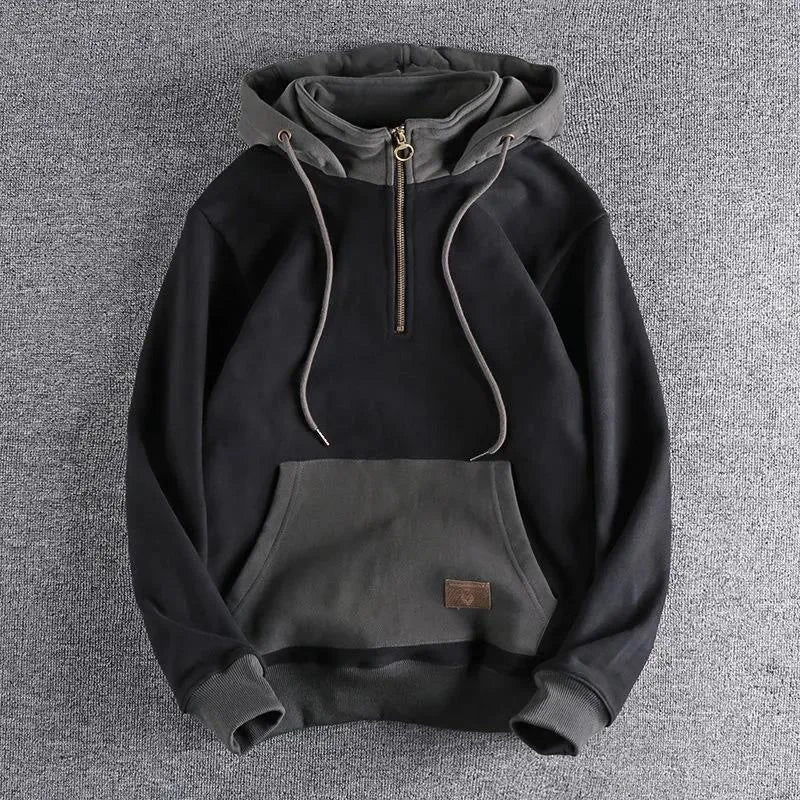 Dual-tone quarter-zip hoodie with ring-pull zipper, adjustable hood, kangaroo pocket for urban style