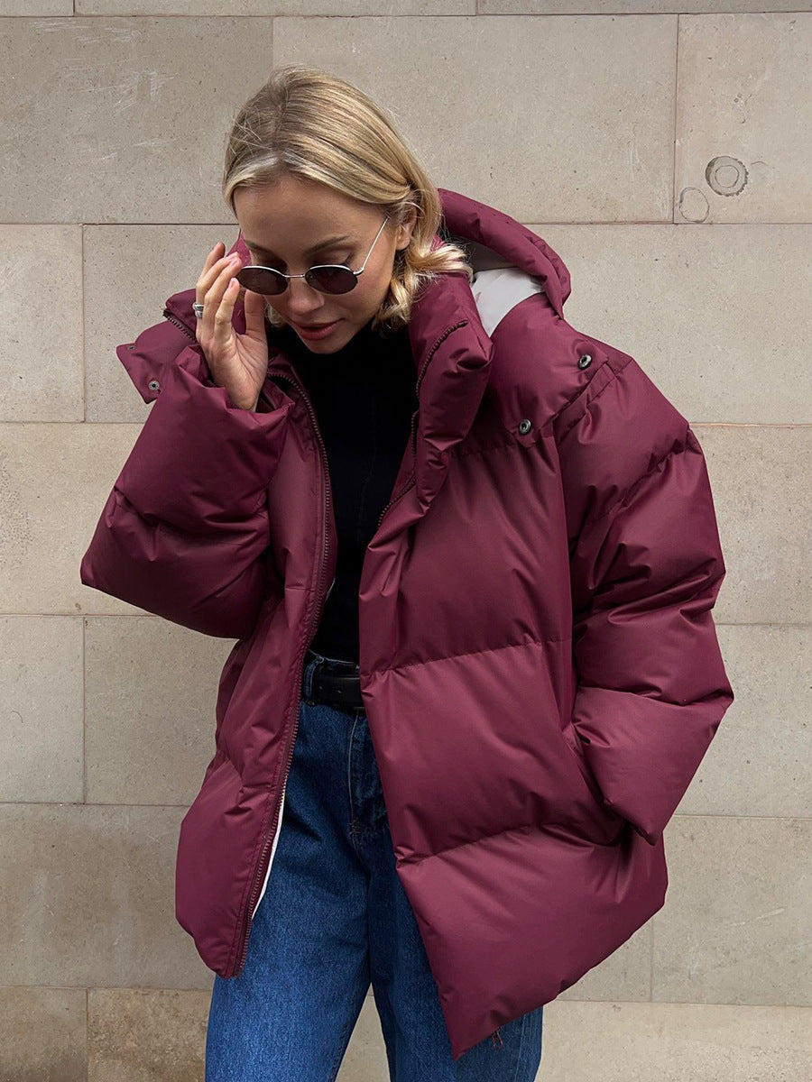 Women's oversized padded winter jacket with hood in cozy street-style silhouette for urban warmth
