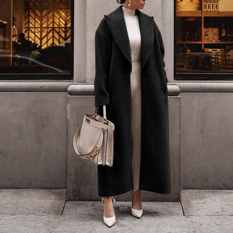 Women's gray beige plush long coat tailored silhouette soft teddy texture chic winter essential