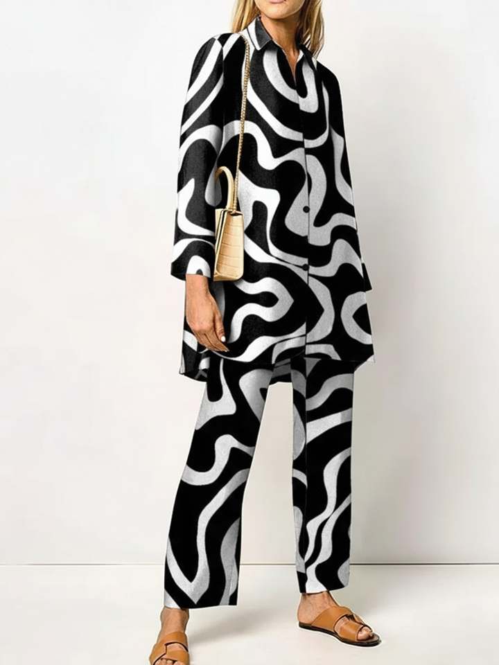 Women's two-piece woven set with relaxed tunic top, straight-leg pants, and pointed collar