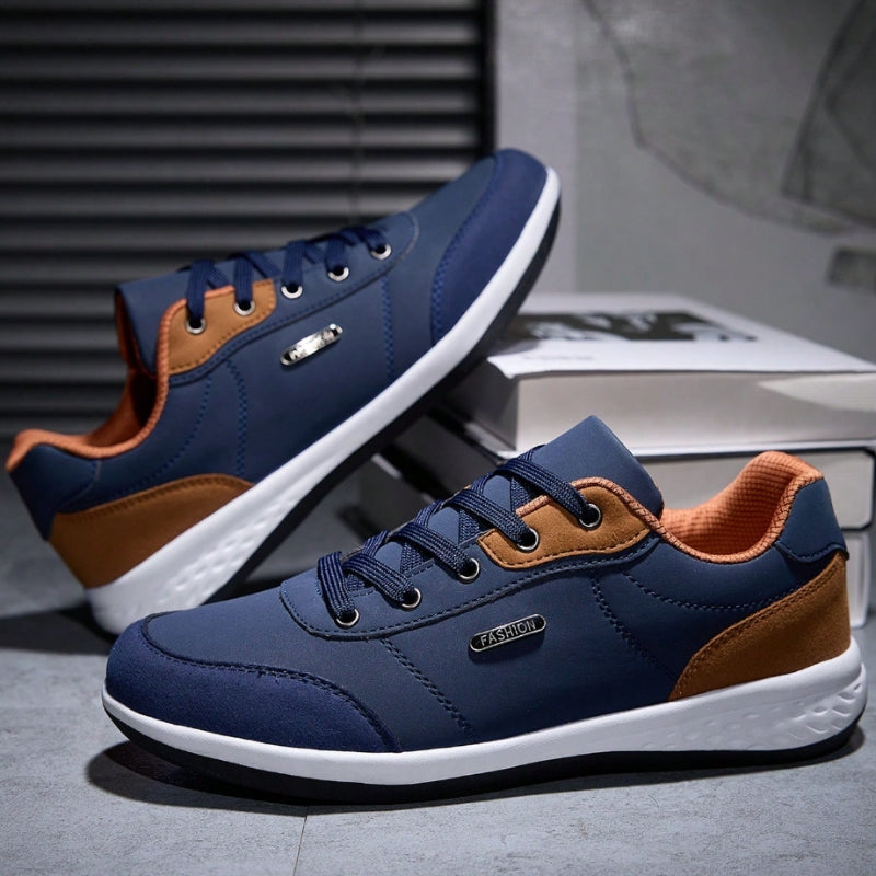 White leather lace-up sneakers with contrasting brown accents, clean silhouette for urban commuting