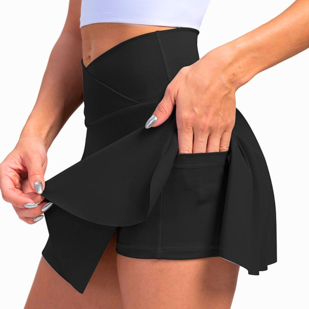 Women's black high-waist flared mini skirt with smoothing compression, built-in shorts, and pockets