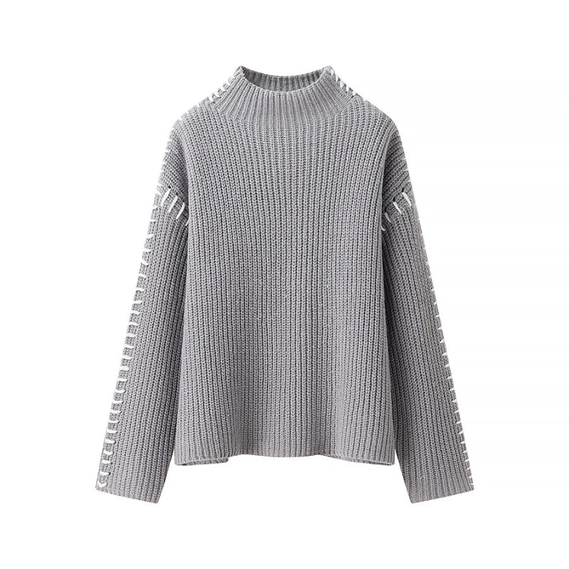 Carmine red knit pullover sweater high neck relaxed fit contrast sleeve detail winter essential
