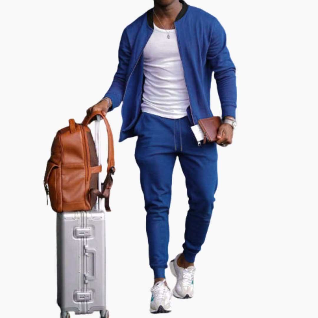 Men's textured zip jacket and tapered pants set in coordinated athleisure style with front zipper