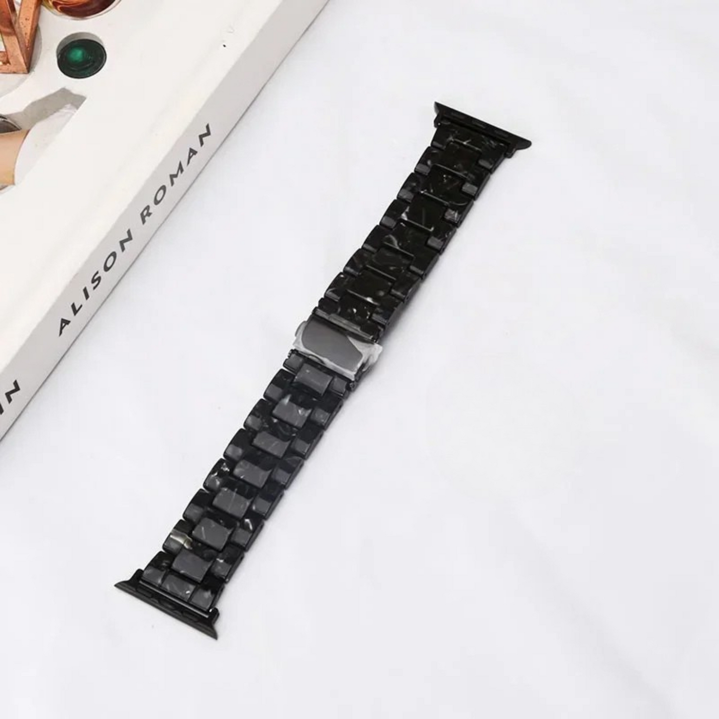 Bold marbled resin Apple Watch band with luminous high-gloss finish and scratch-resistant adjustable links