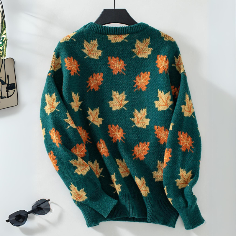 Women's beige lightweight knit sweater with tonal maple leaf jacquard and round neckline