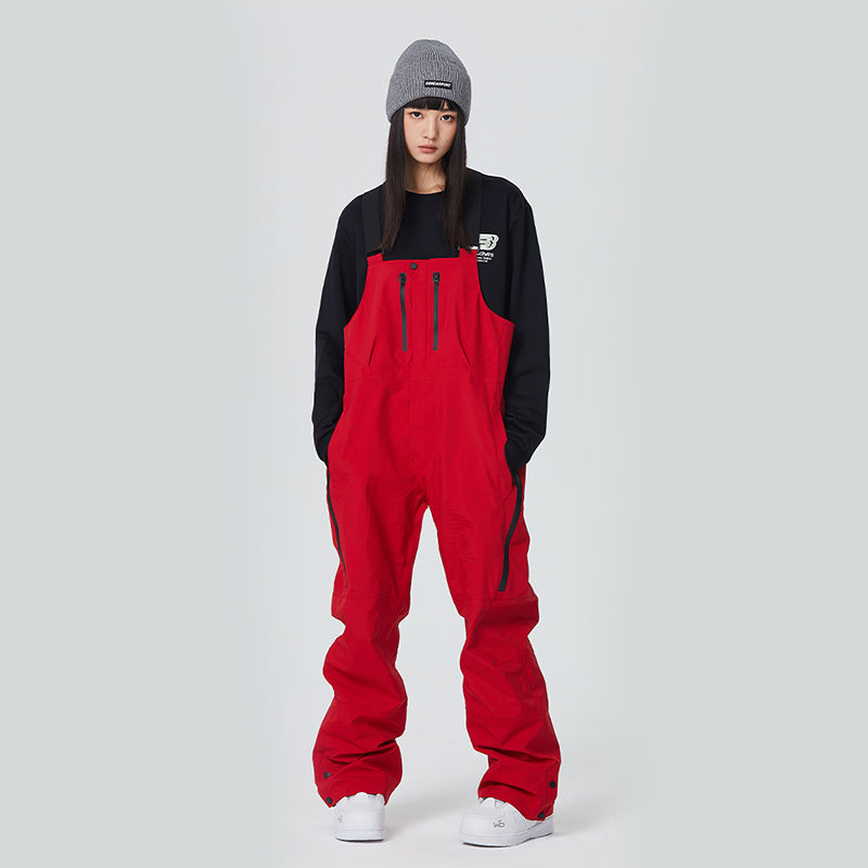 Women's olive green waterproof snow bib pants with adjustable suspenders and fully taped seams