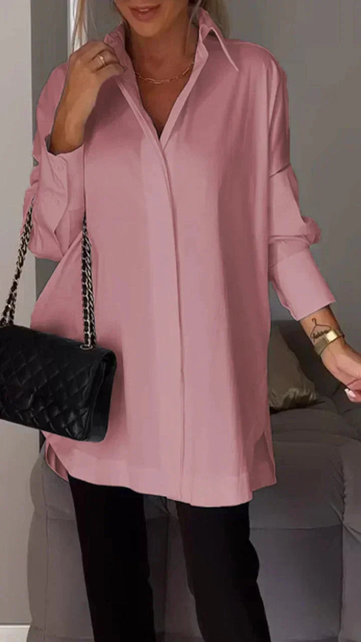 Women's oversized white blouse rolled-up sleeves relaxed silhouette easy-care casual chic style