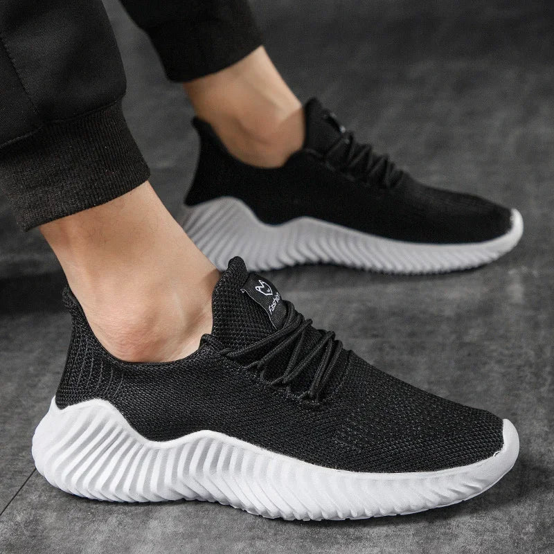 Velocity lightweight athletic trainer sneakers with breathable knit upper and shock-absorbing soles for active wear