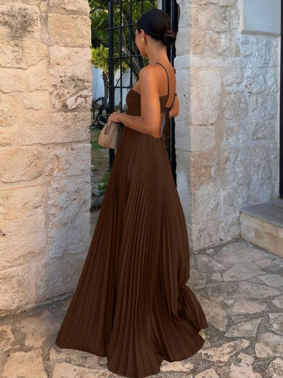 Women's ivory maxi strapless pleated dress with crossed back halter neckline, effortless summer chic silhouette