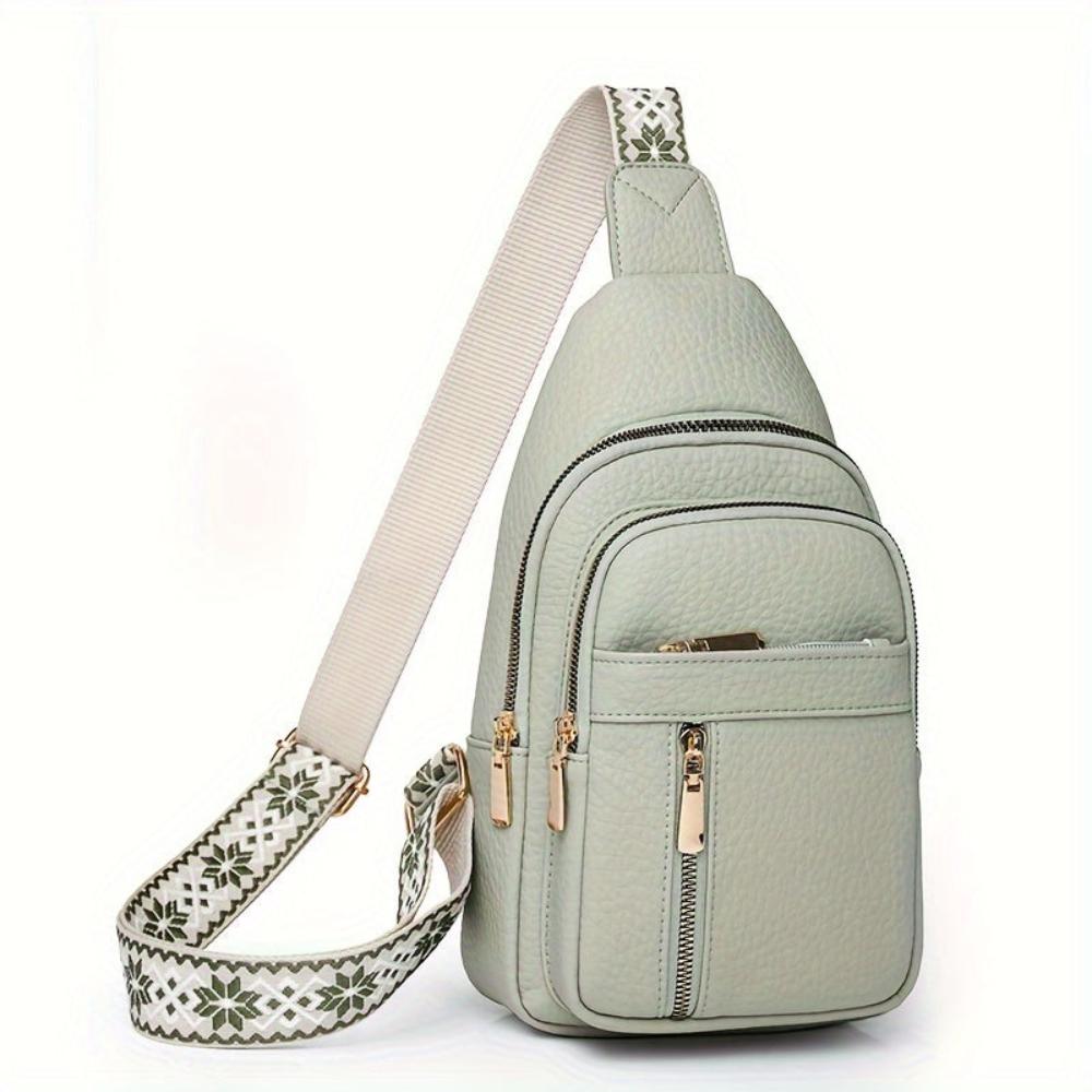 Elise black grain vegan leather crossbody bag with top zip closure, compact and elegantly structured