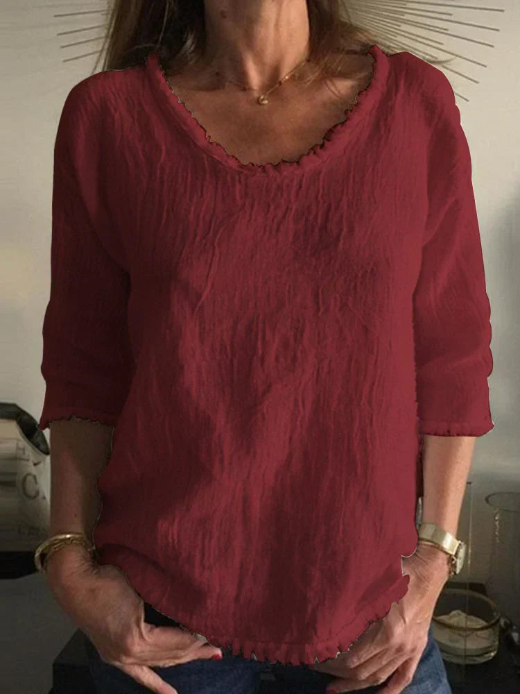 Casual unisex linen shirt in neutral tones, relaxed fit with breathable fabric for all-day comfort