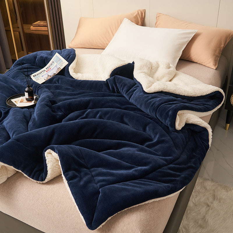 Reversible sherpa flannel throw blanket in neutral tones with dual-texture cozy design for home lounging