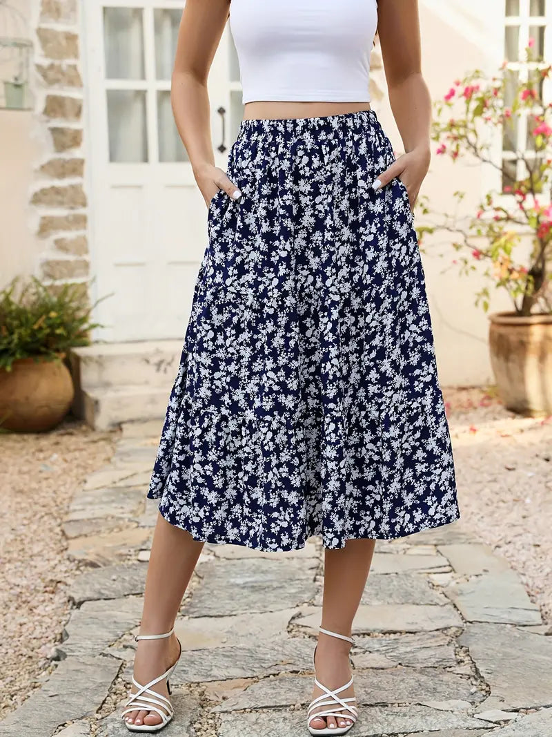 Women's vibrant floral print flared A-line skirt with functional pockets, spring fashion essential
