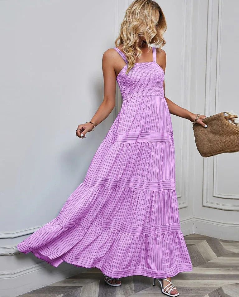Elegant floral maxi dress with smocked bodice and flowy A-line silhouette for women