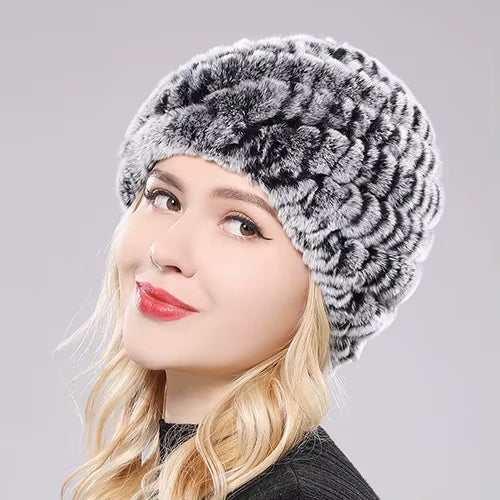 Women's plush rabbit fur beanie with sculpted wave texture in stretch fit for winter warmth