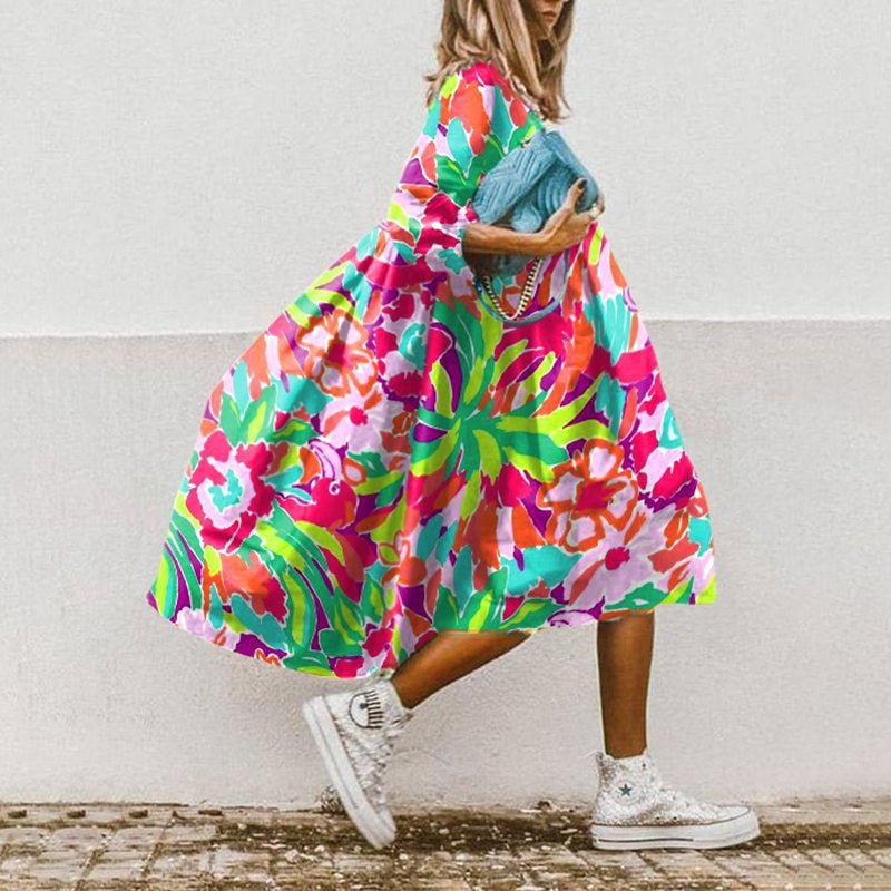 Women's flowing floral dress elegant silhouette puff sleeves sunny chic casual style