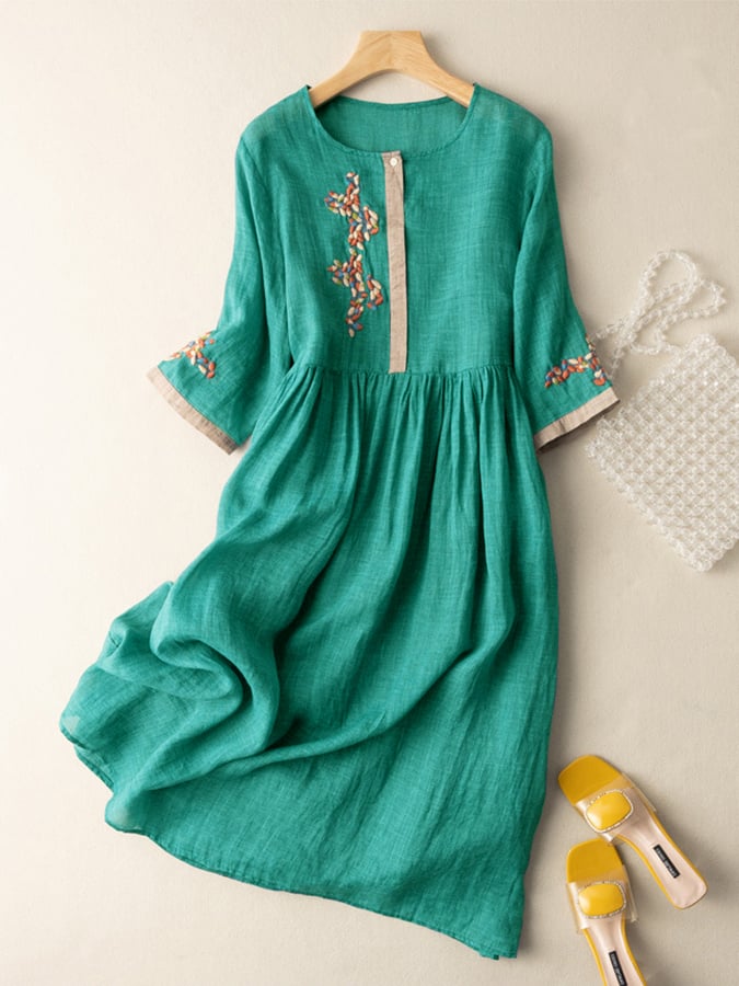 Women's relaxed fit cotton linen dress with embroidered button closure and three quarter sleeves