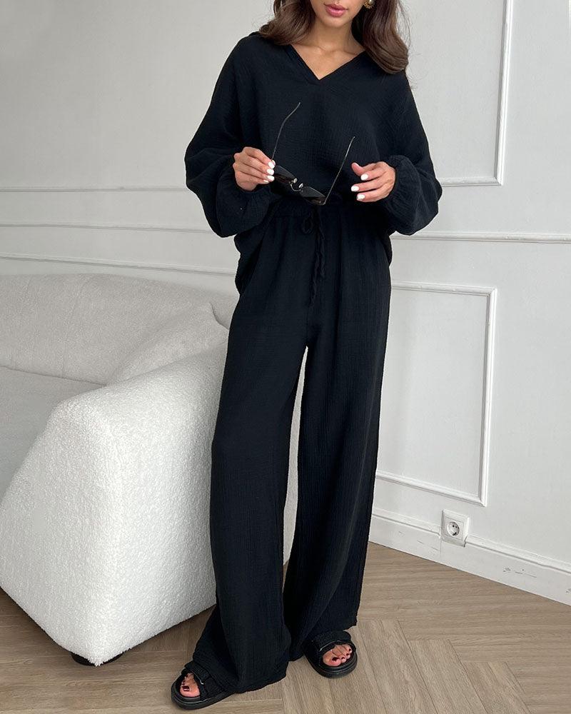 Women's casual two-piece set with V-neck top, relaxed fit, coordinating bottom in autumn tones