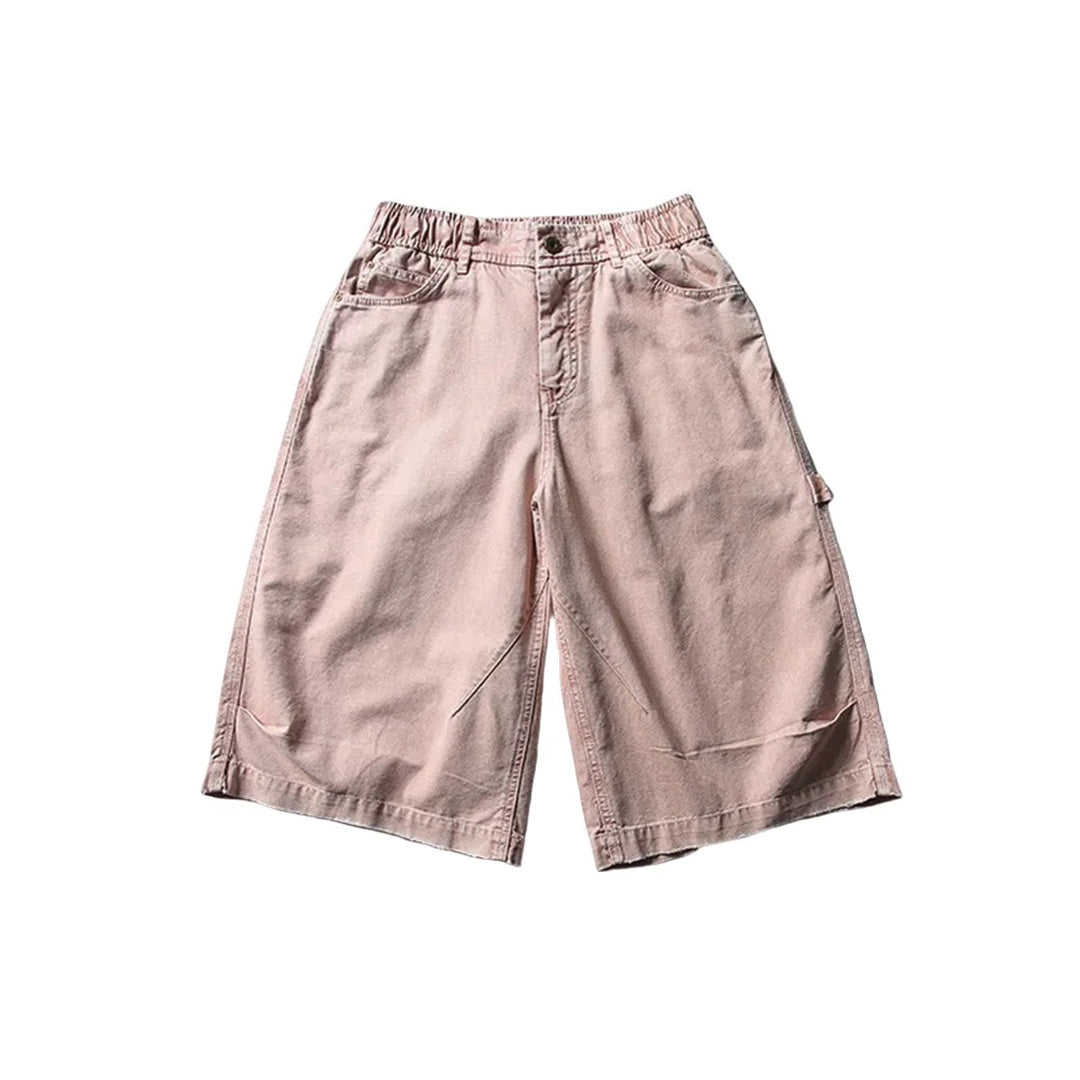 Men's oversized cotton canvas utility shorts in washed neutrals with reinforced hem and cargo pockets