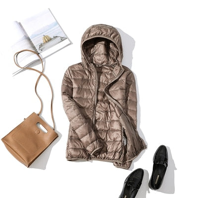 Women's short quilted winter jacket zip-front warm casual coat lightweight city-ready silhouette