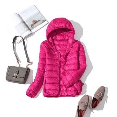 Women's short quilted winter jacket zip-front casual coat warm lightweight city-ready silhouette