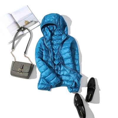 Women's short quilted winter jacket zip-front warm casual coat sleek city-ready silhouette