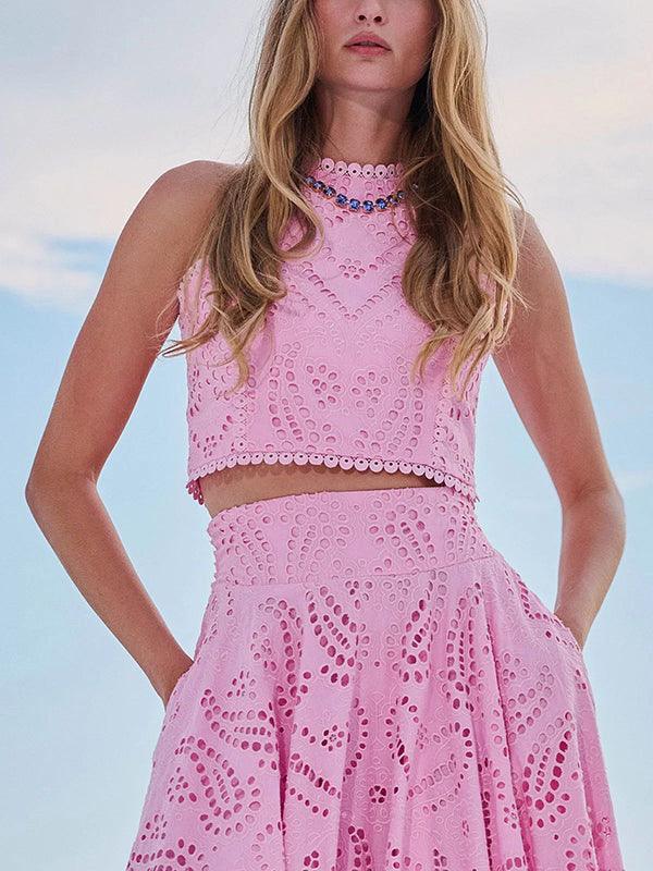White sleeveless embroidered lace top with intricate hollow cutout detailing for women
