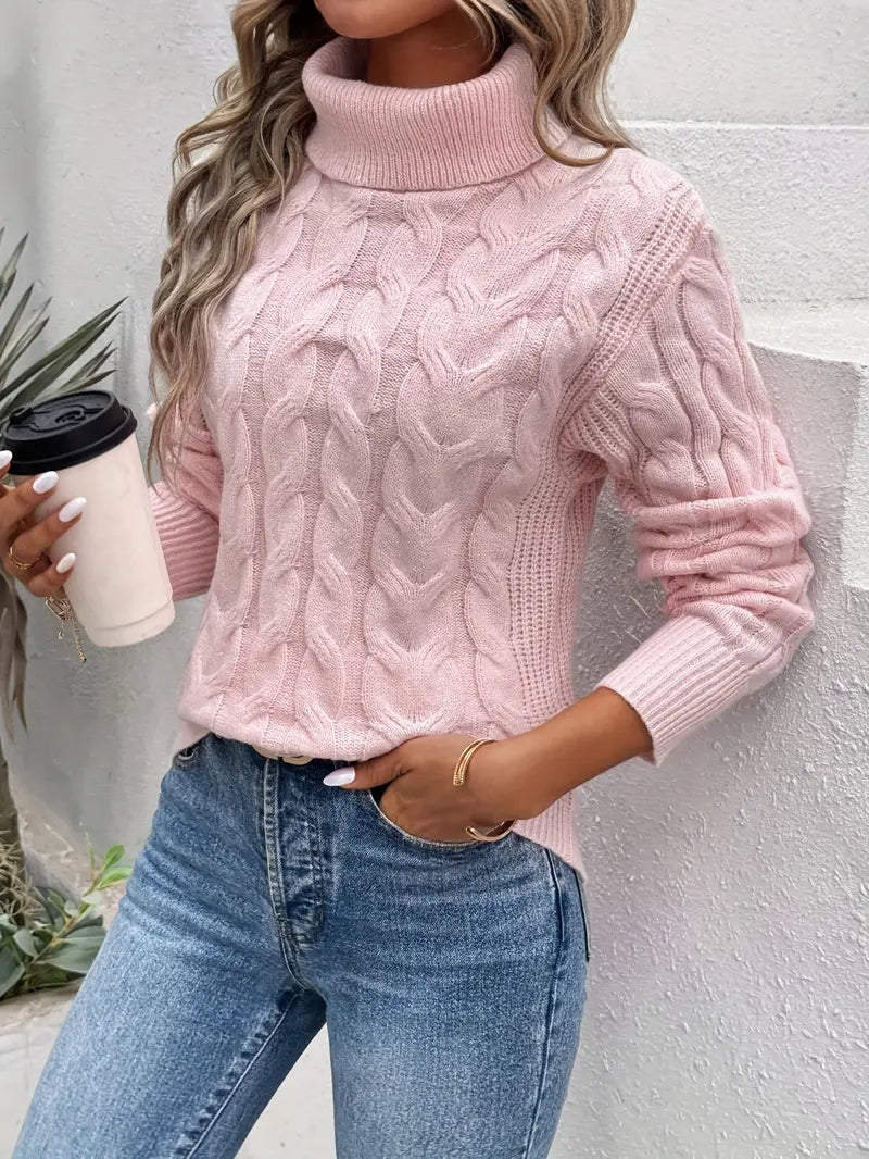 Women's cable knit turtleneck sweater in neutral tone, classic cozy fit with textured pattern