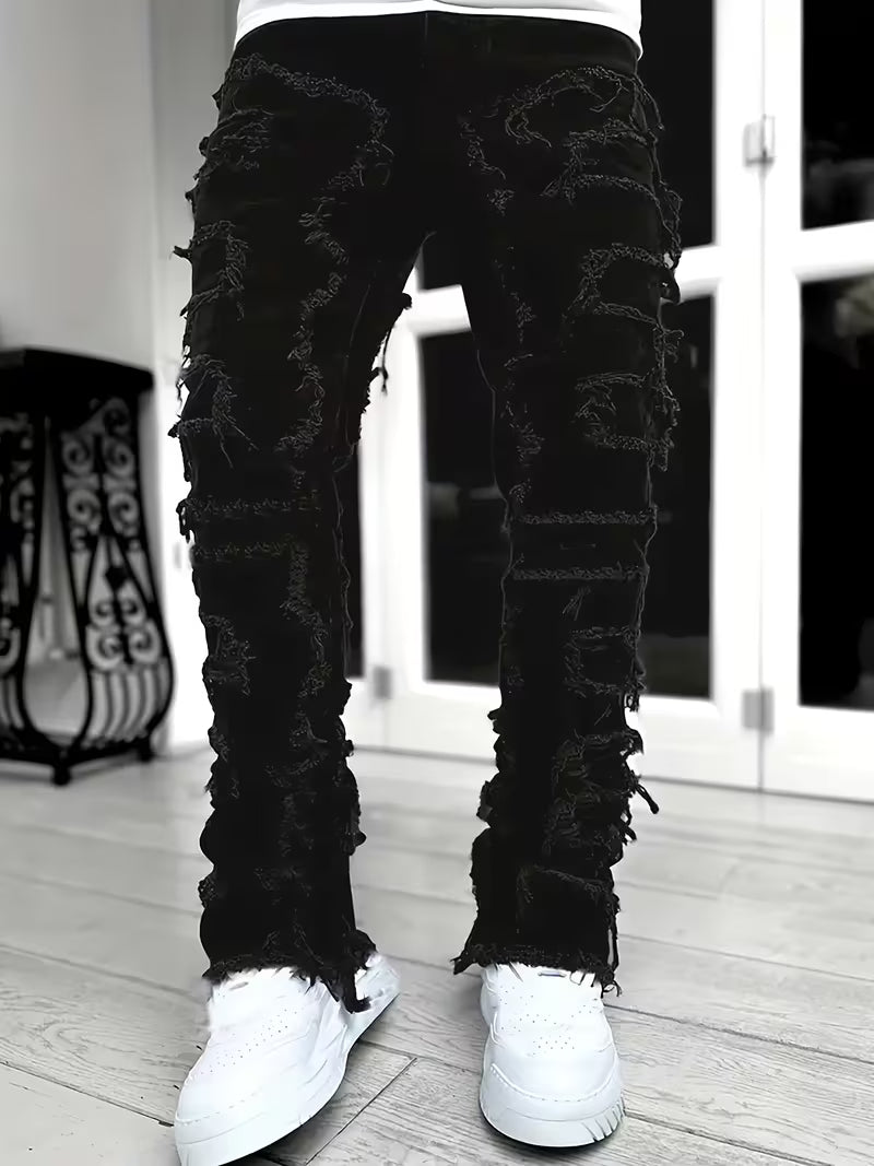 Blue distressed layered denim tapered jeans with heavy fraying and reinforced seams streetwear style