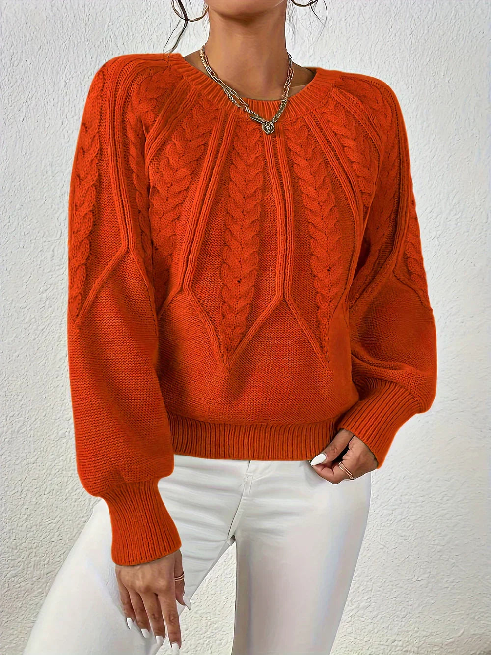 Women's cream relaxed-fit knit sweater with textured cable crochet pattern and clean silhouette