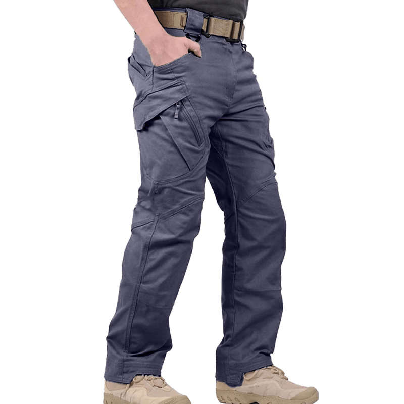 Men's black tactical waterproof pants with reinforced stitching and multiple utility pockets