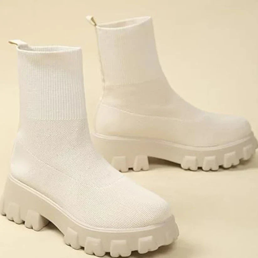 Women's knitted ankle boots neutral tone slip-on style with flexible knit upper and fashionable sole