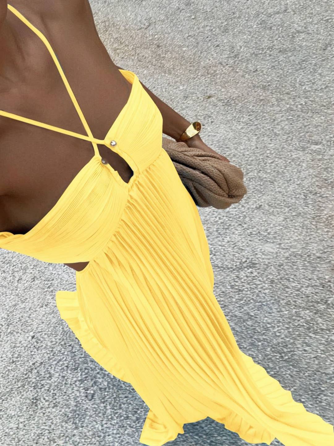 Women's maxi strapless pleated dress with crossed back halter neckline, elegant summer chic silhouette