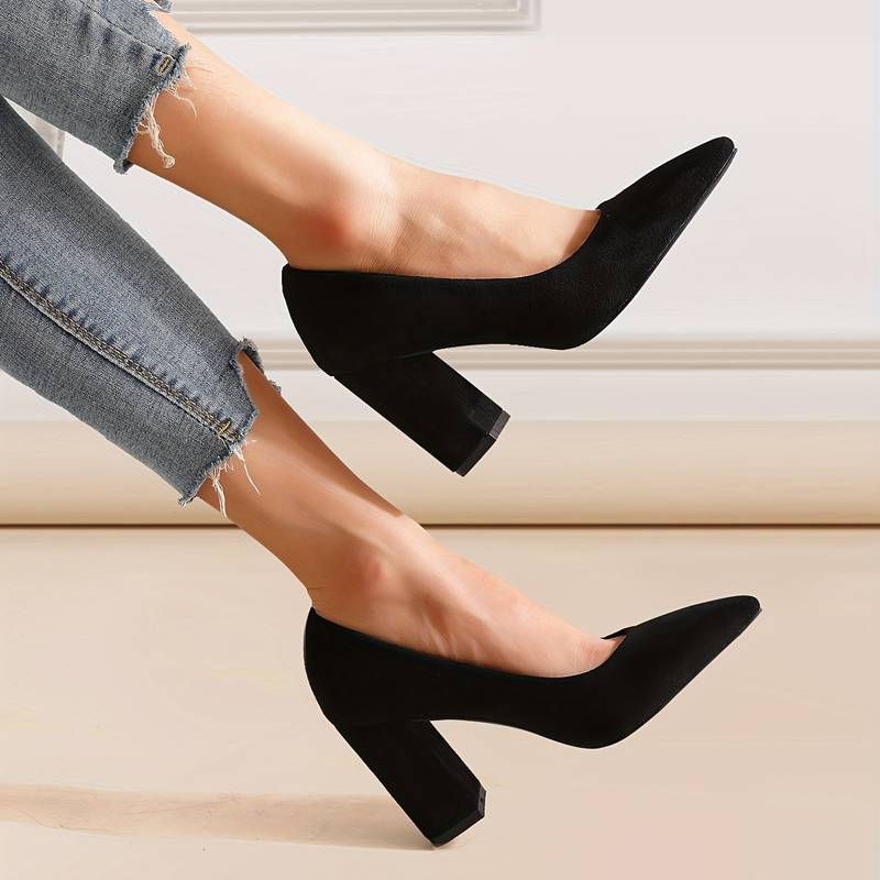 Women's pointed toe block heel pumps in classic style, versatile for office and festive occasions