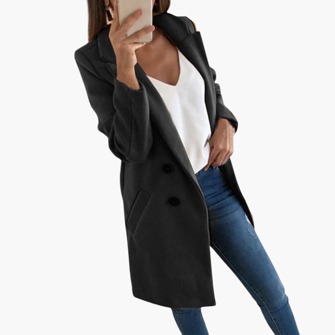Women's classic coat with fold-over collar, button closure, long sleeves, and side pockets