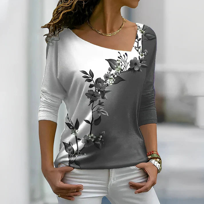 Vibrant floral print t-shirt in contrasting colors, casual relaxed fit with botanical pattern