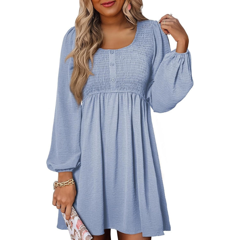 Valore smocked empire waist A-line dress in breezy silhouette with forgiving smocked bodice